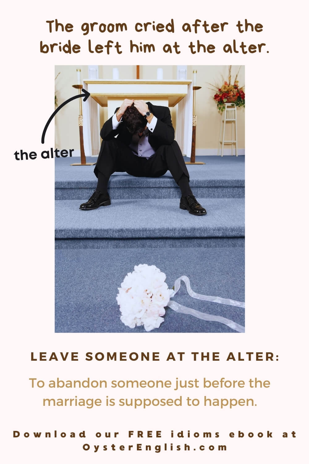 A sad groom, who's sitting in front of an alter in a church, cries with his head in his hands. The bride's bouquet of flowers dropped on the floor in front of him.