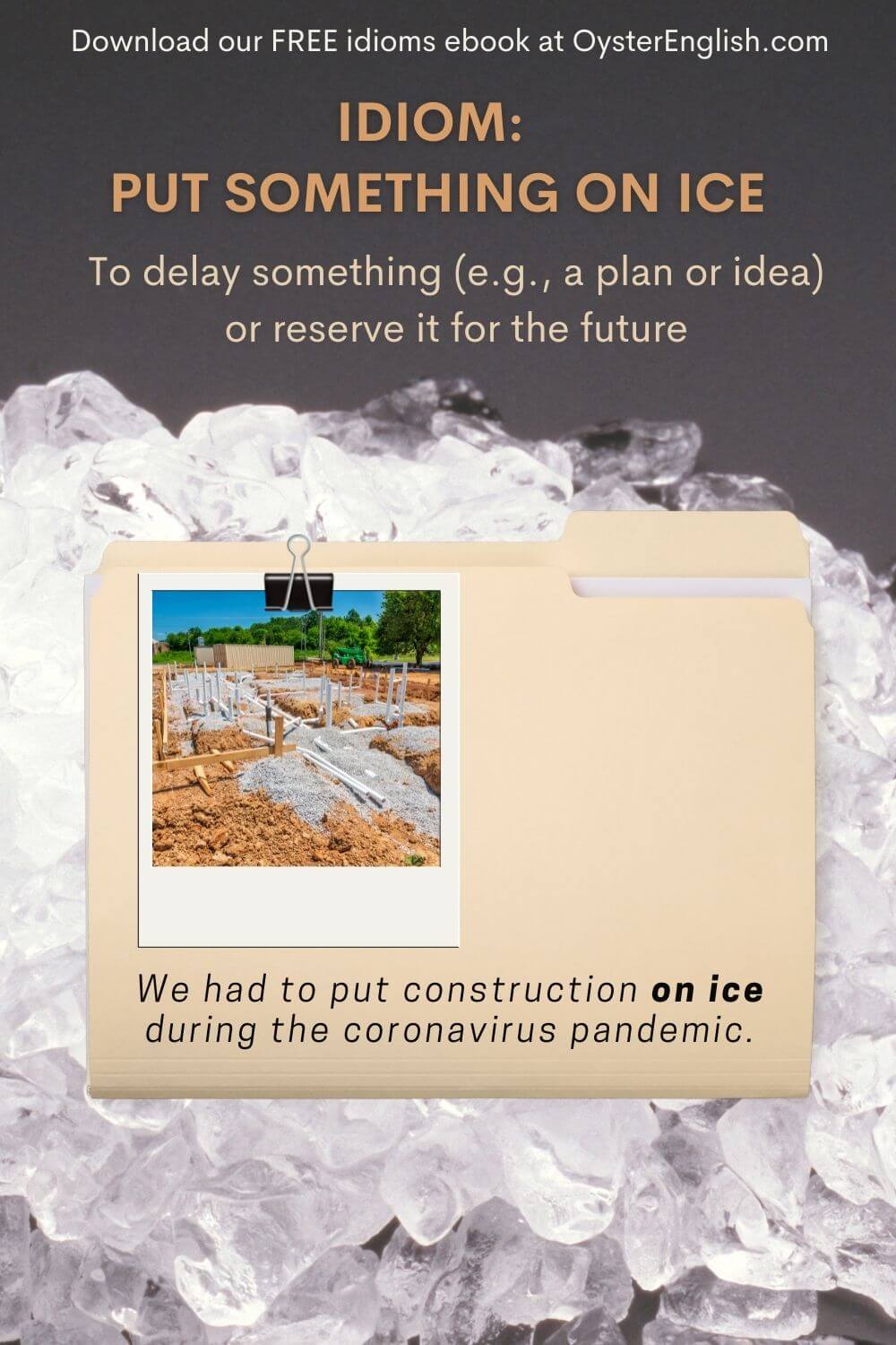 A business folder with a photo of an unfinished construction project is placed on top of crushed ice. "We had to put construction on ice during the Coronavirus pandemic."