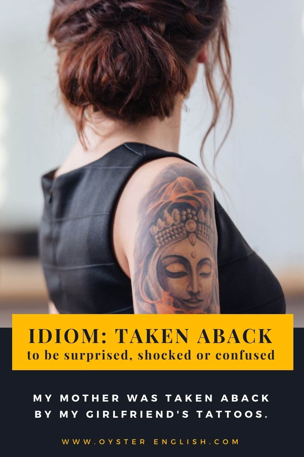 Picture of woman wearing a sleeveless dress with a large tattoo covering her harm to illustrate the idiom, "taken aback." Example given: My mother was taken aback by my girlfriend's tattoos.