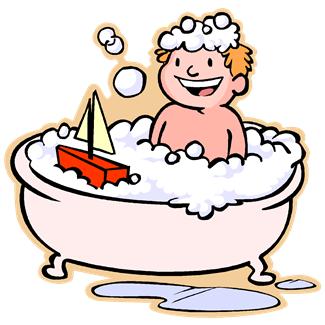 A boy takes a bubble bath
