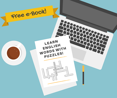 Illustration of a laptop, sheets of paper with crossword puzzles and a coffee cup with the advertisement "free e-book" learn English words with puzzles.
