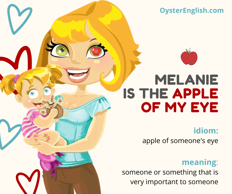 A smiling cartoon mother is holding her young child. The mother has a little red apple in the pupil of her eye. Caption: Melanie is the apple of my eye.