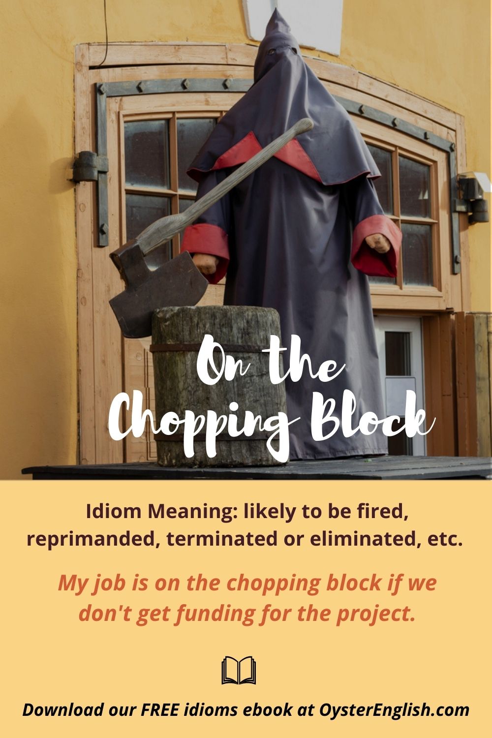 A Medieval executioner, wearing a hooded cloak, stands at a chopping block that has a huge ax in it. Caption: My job is on the chopping block if we don't get funding for the project.